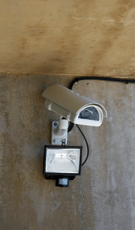 surveillance security camera and movement spotlight